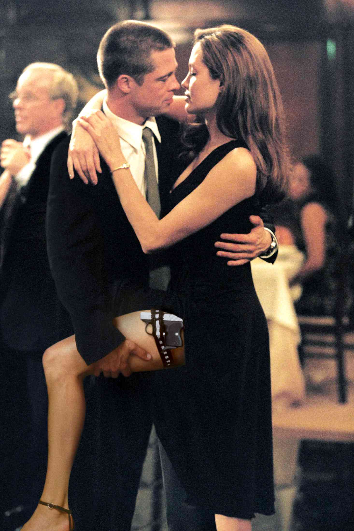 U.S. actors Brad Pitt and Angelina Jolie act as John and Jane Smith in the movie "Mr. and Mrs. Smith" in this photo released on June 06, 2005. The movie, which portrays a married couple who happen to be highly paid efficient assassins and work for competing organizations, opens in the United States on June 10, 2005. NO ARCHIVES NO THIRD PARTY SALES  REUTERS/Stephen Vaughn/20th Century Fox/Handout***DO NOT DELETE***DO NOT PURGE