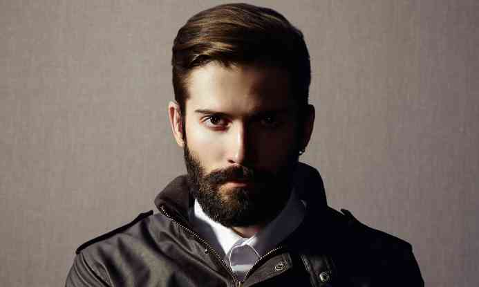 Portrait of handsome man with beard. Fashion photo