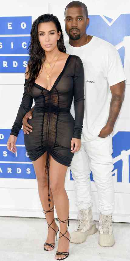 Kim Kardashian in Jhon Galliano and Kanye West